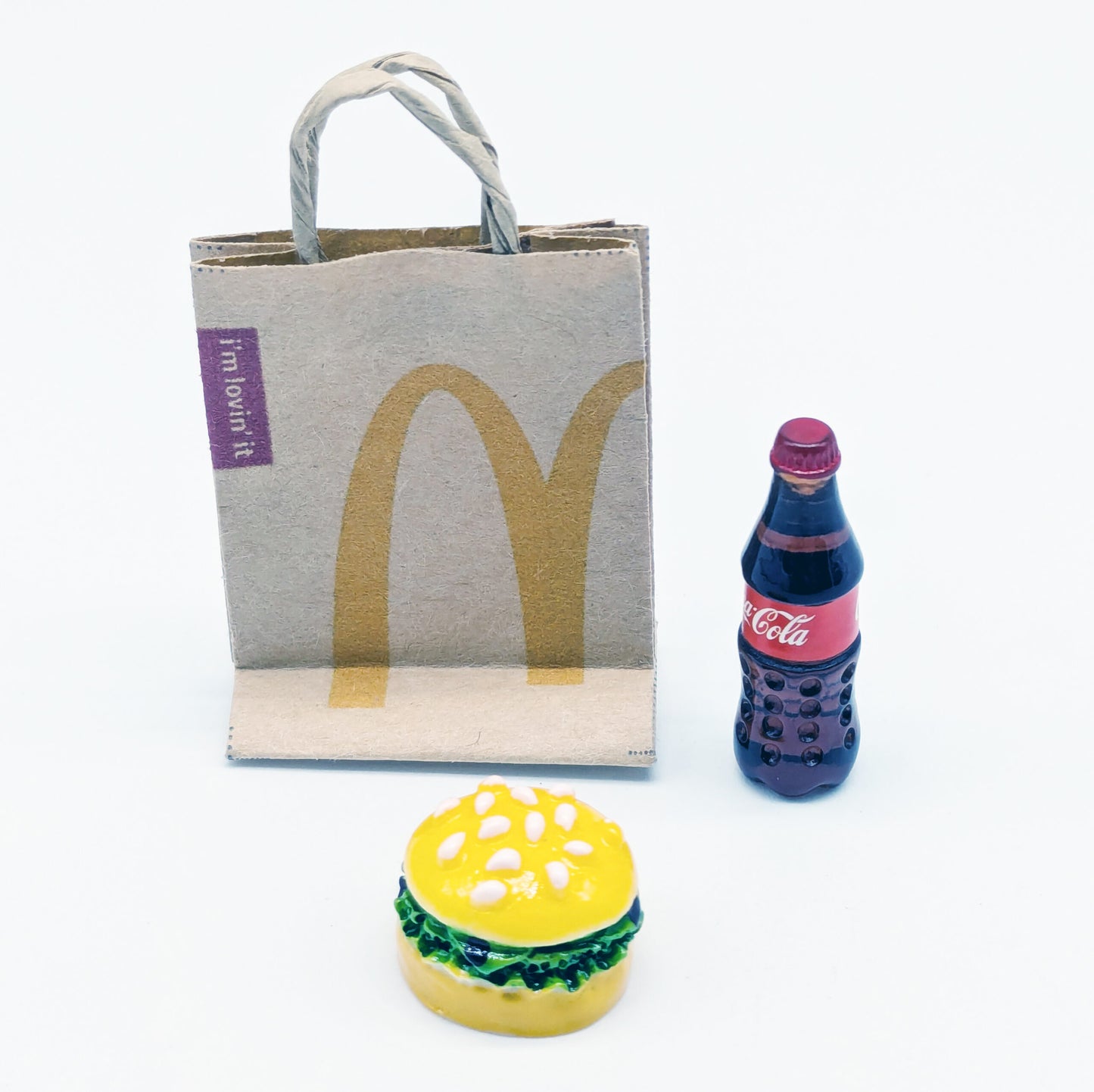 Ensemble liqueur, méga burger et sac de papier 1/10 (WAGDEC10BURBAG)