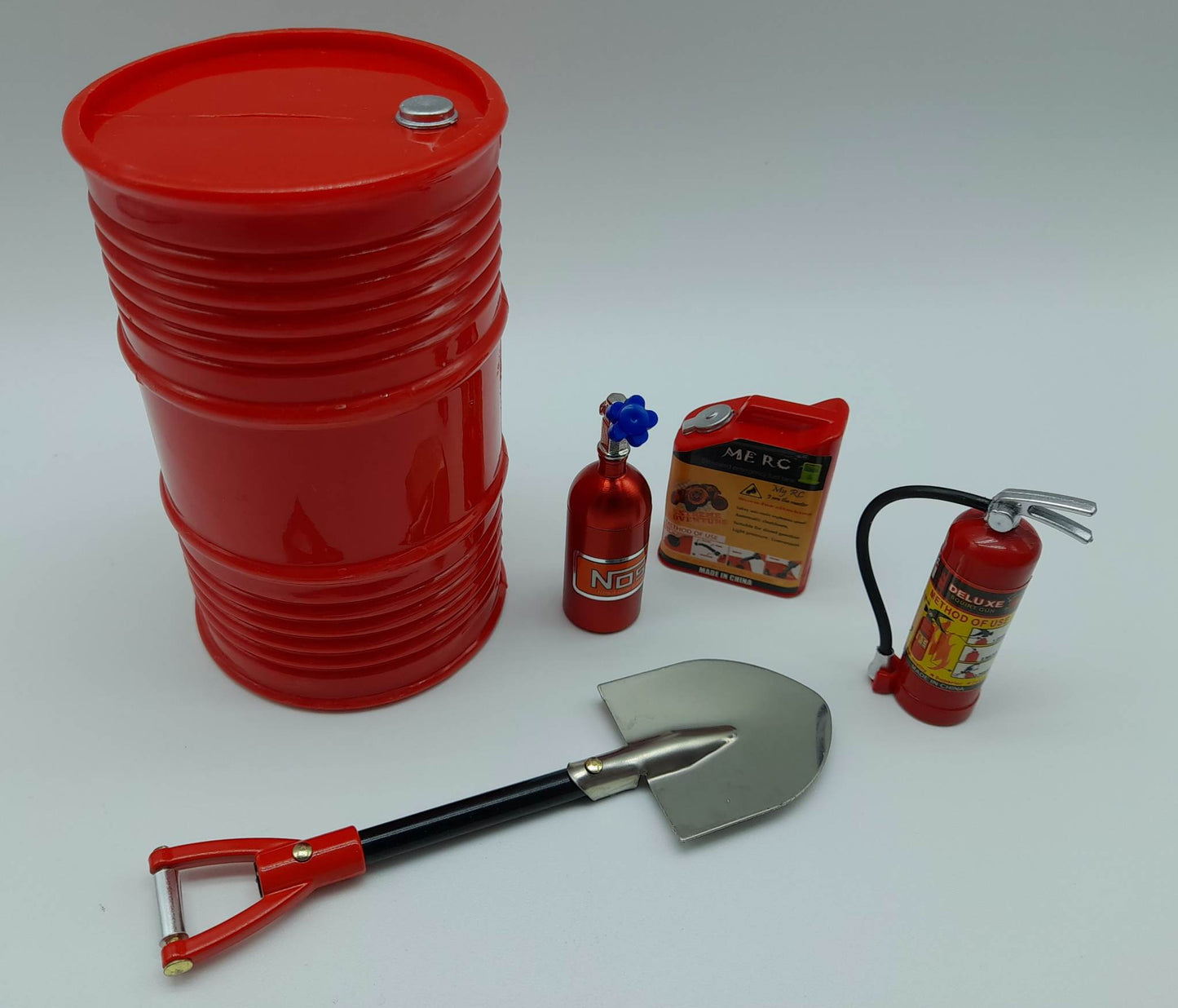 Ensemble bidons d’essence , Baril , Extincteur , Pelle grandeur et Bouteille de NOS 1/10 (KS-110)