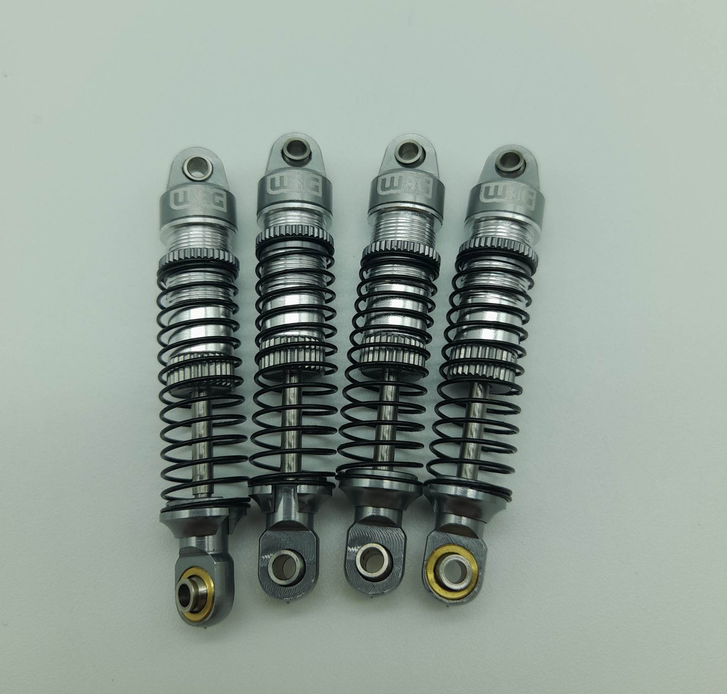 Lot de 4 amortisseurs 1/18 pour TRX-4M (gris foncé) (WAGSHKTX4M4GM)